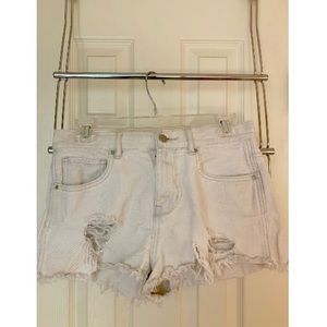 Women’s distressed white jean shorts